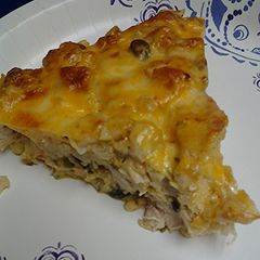 A picture of Cheesy cauliflower and chicken casserole.