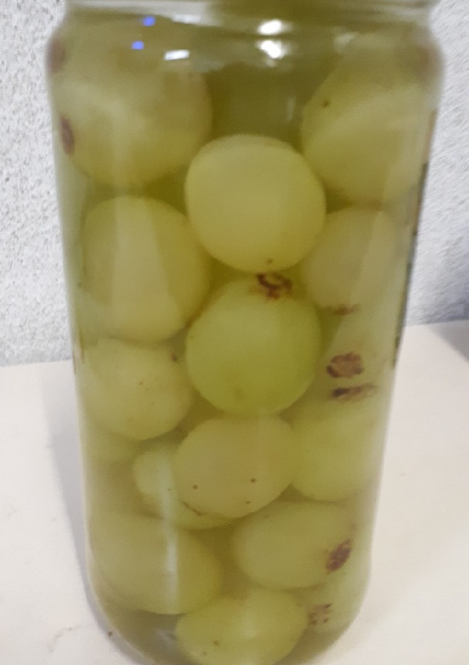 Una foto de Uvas al orujo blanco