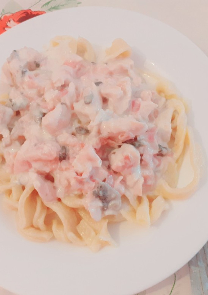 Una foto de Fideos caseros con salsa parisienne