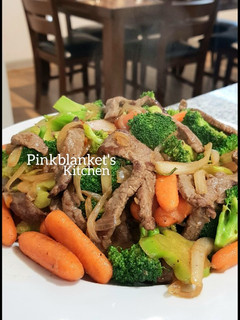 A picture of Broccoli, Carrot and Beef stir fry.
