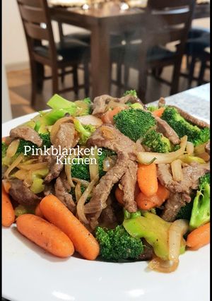 A picture of Broccoli, Carrot and Beef stir fry.