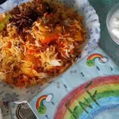 A picture of Chicken achari biryani.
