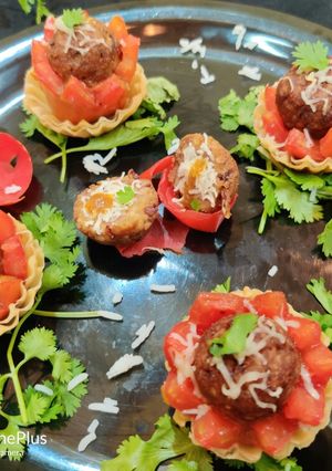A picture of Baked Cheese burst rajma stuffed Tomato Tarts.