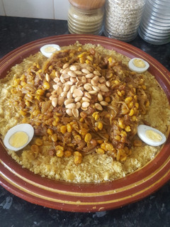 A picture of Moroccan Couscous with Onions and Raisins (Tfaya).