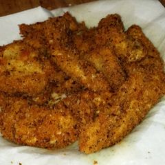 A picture of Panko breaded parmesan chicken strips.