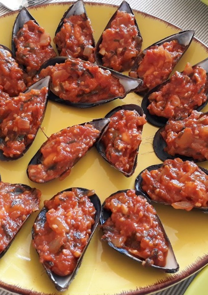 Una foto de Mejillones con sofrito