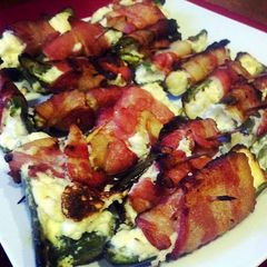 A picture of Bacon Stuffed Wrapped Jalapeños.