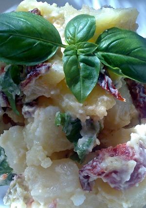 A picture of Sig's potato salad with sun-dried tomato, chorizo and pistachio nuts,.