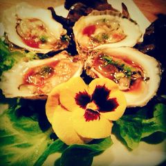 A picture of Raw Oysters With Ponzu Sauce.
