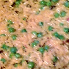 saffron yellow rice and sweet peas A picture of saffron yellow rice and sweet peas.