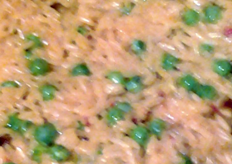 saffron yellow rice and sweet peas