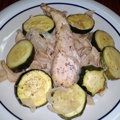 A picture of herb n garlic chicken breast w/onion n zucchini..