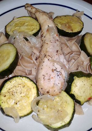 A picture of herb n garlic chicken breast w/onion n zucchini..