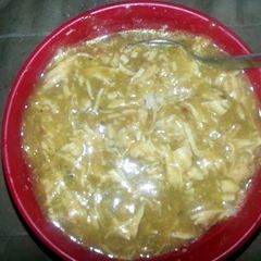 A picture of semi homemade green chilli chicken and rice.
