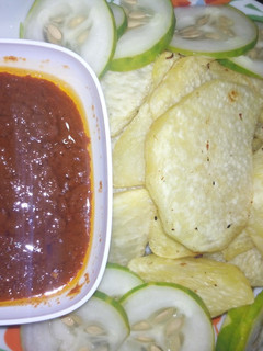 A picture of Fried yam with stew.
