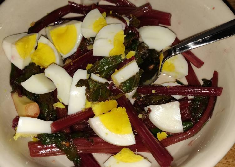 Sauteed beet greens with hard boiled egg
