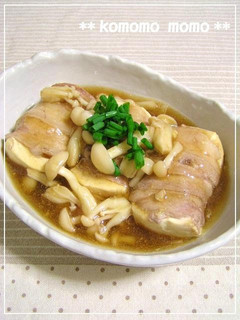 A picture of Tofu Wrapped with Pork Served with Thick Mushroom Sauce.