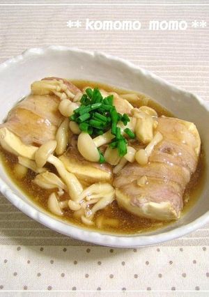 A picture of Tofu Wrapped with Pork Served with Thick Mushroom Sauce.