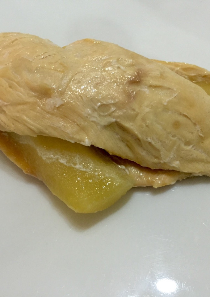 Una foto de Pechuga de pollo al papillote con manzana asada
