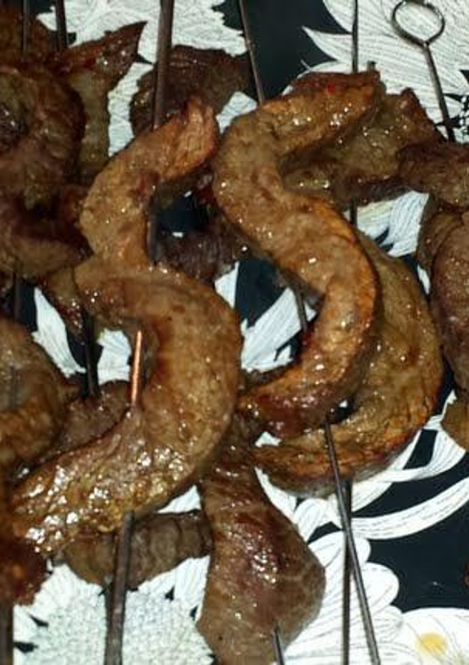 A picture of Steak on a stick.