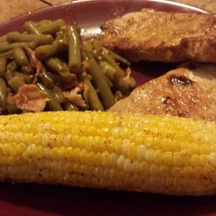 A picture of Roasted corn on the cob.
