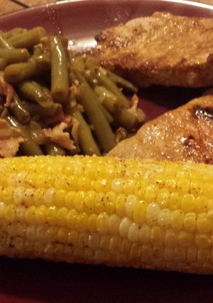 A picture of Roasted corn on the cob.