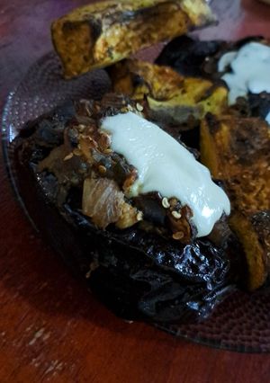 Una foto de Berenjena rellena de verduras