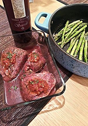 A picture of Filet Mignon With Red Wine Chili Garlic Sauce & Teriyaki Sauteed Asparagus..