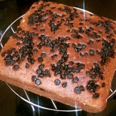 A picture of Yummiest Orange Chocolate Chip Cake (eggless).