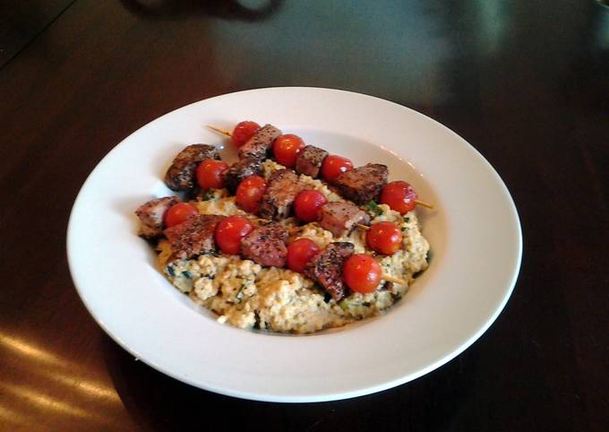 Grilled lamb and tomato kabobs with mushroom, lemon, amd parmesan couscous
