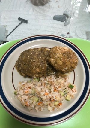 A picture of Chicken Meatballs with Cheese and Egg in Green Sauce.