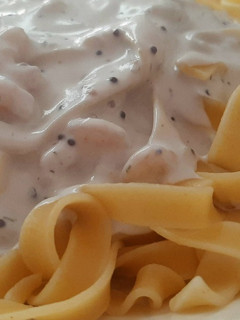 Una foto de Tallarines con bechamel marina