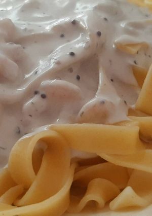 Una foto de Tallarines con bechamel marina