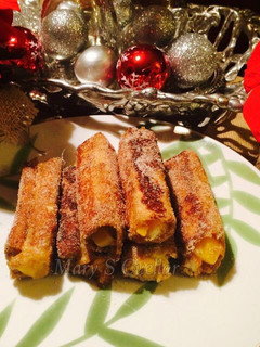 Una foto de Rollitos de pan francés rellenos de mi cocina😋😋