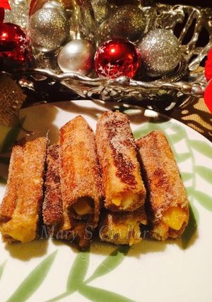 Una foto de Rollitos de pan francés rellenos de mi cocina😋😋
