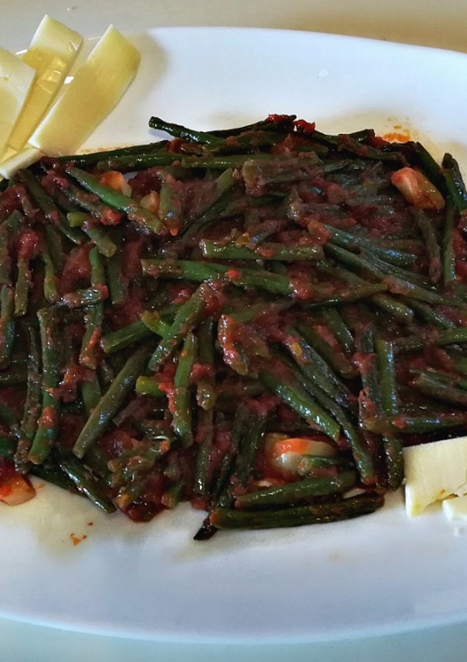 Una foto de Judías verdes con tomate