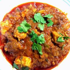 A picture of Spicy red hot chicken curry.