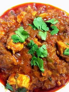 A picture of Spicy red hot chicken curry.