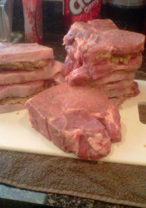 A picture of stuffed pork chops.