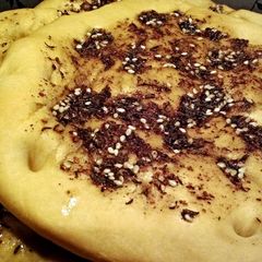 A picture of Middle Eastern Flatbread with Zaatar seasoning.