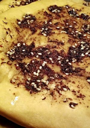 A picture of Middle Eastern Flatbread with Zaatar seasoning.