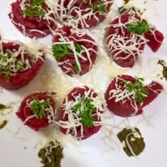 A picture of Beetroot sooji rolls.