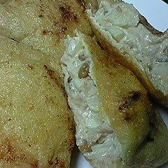 A picture of Aburaage Filled with Natto, Tuna and Mayonnaise.
