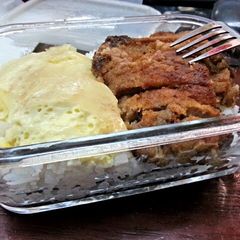 A picture of Bread Crumb Pork Chop and Steam Egg Lunch Box.