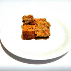 A picture of Naughty Cinnamon Carrot Basil Cake.