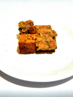 A picture of Naughty Cinnamon Carrot Basil Cake.
