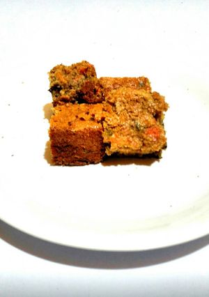 A picture of Naughty Cinnamon Carrot Basil Cake.