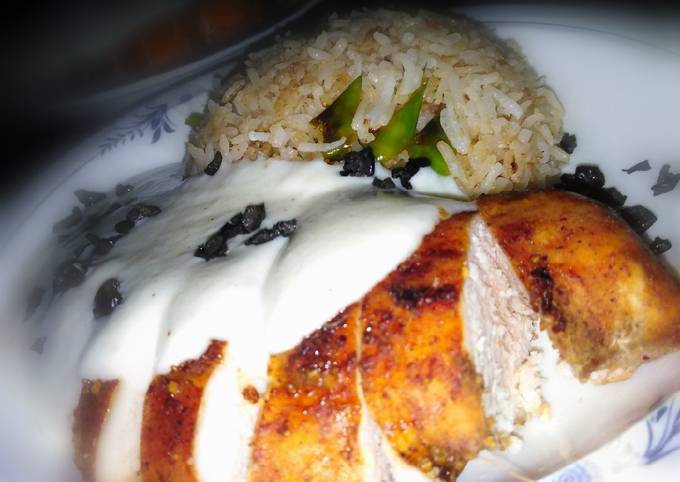 Chicken steak with chilli garlic rice and white sauce