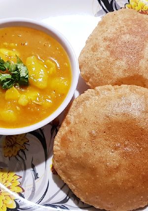 A picture of Aloo Sabji and Poori.