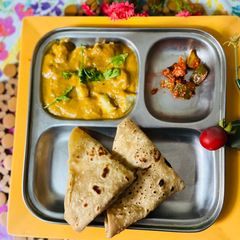 A picture of Kaju Butter masala with potato,side dish for chapati.